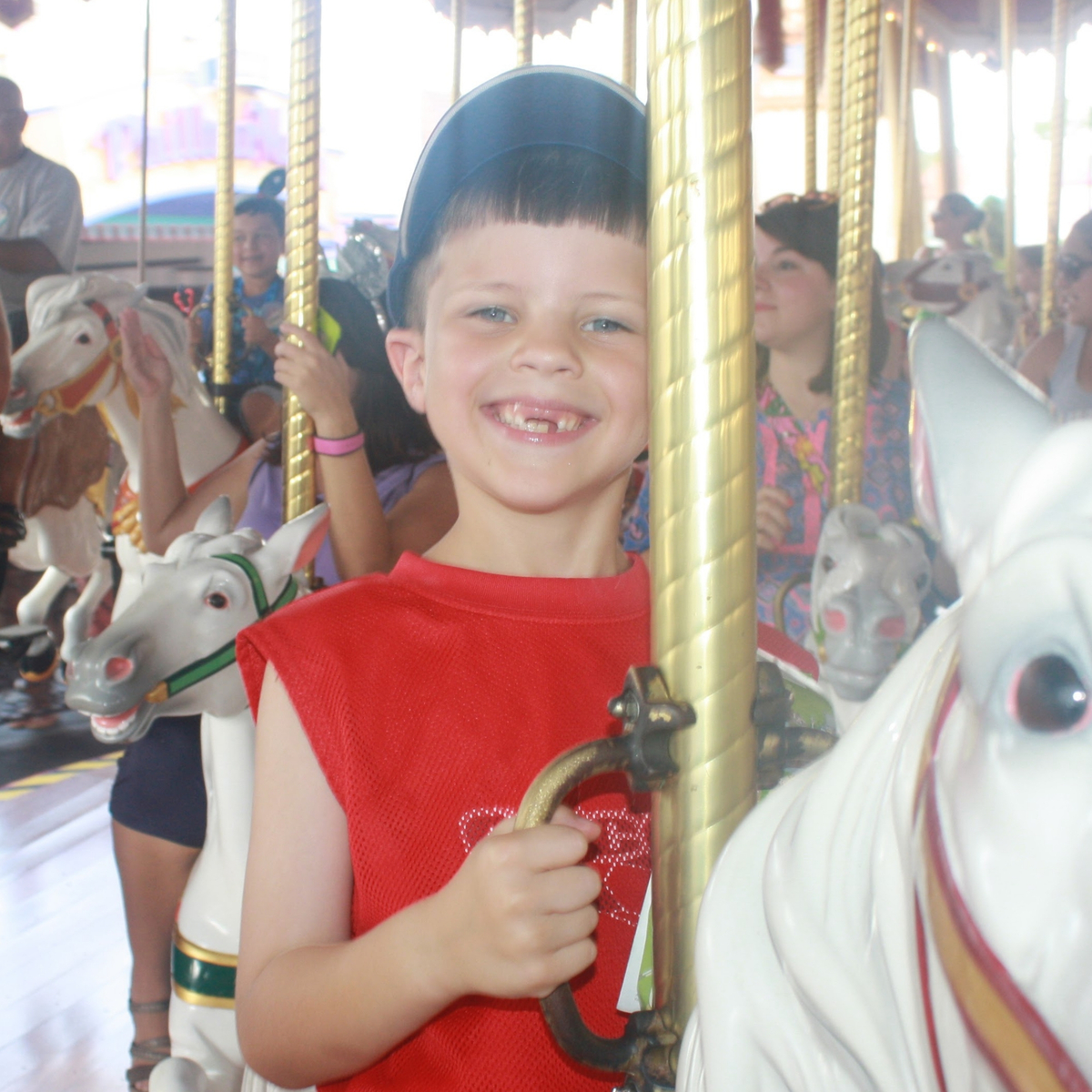 a boy missing his front teeth